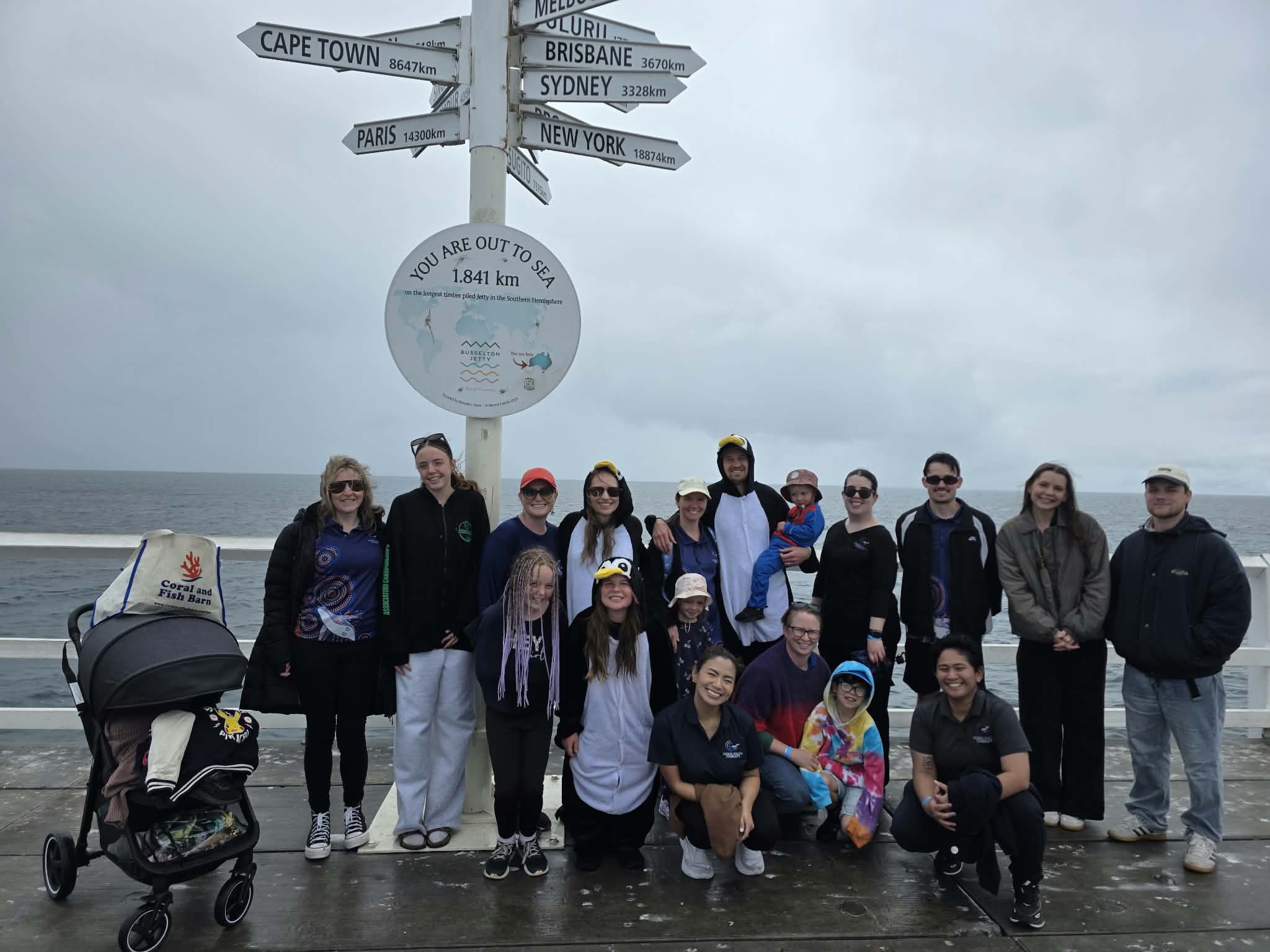 DST team members and families gathered by the coast